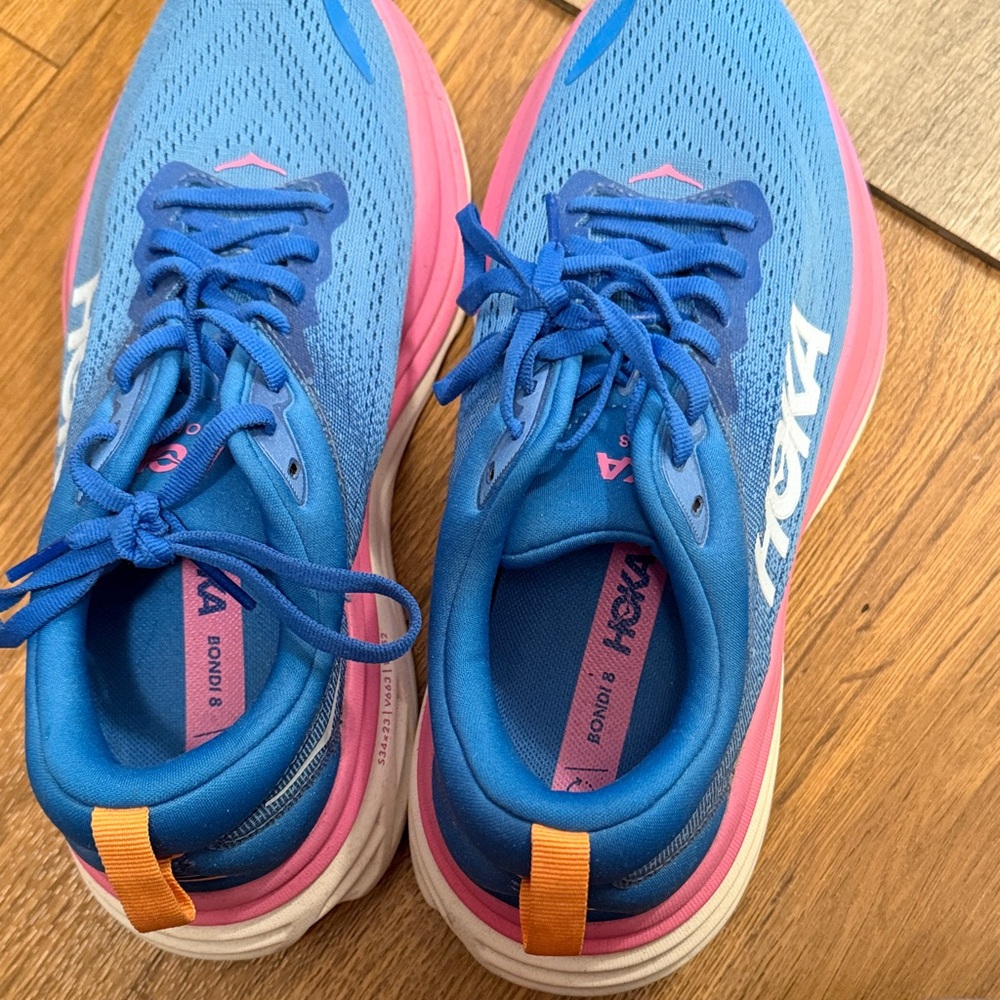 Hoka Women's Bondi 8… Vibrant Blue and Pink Shoes